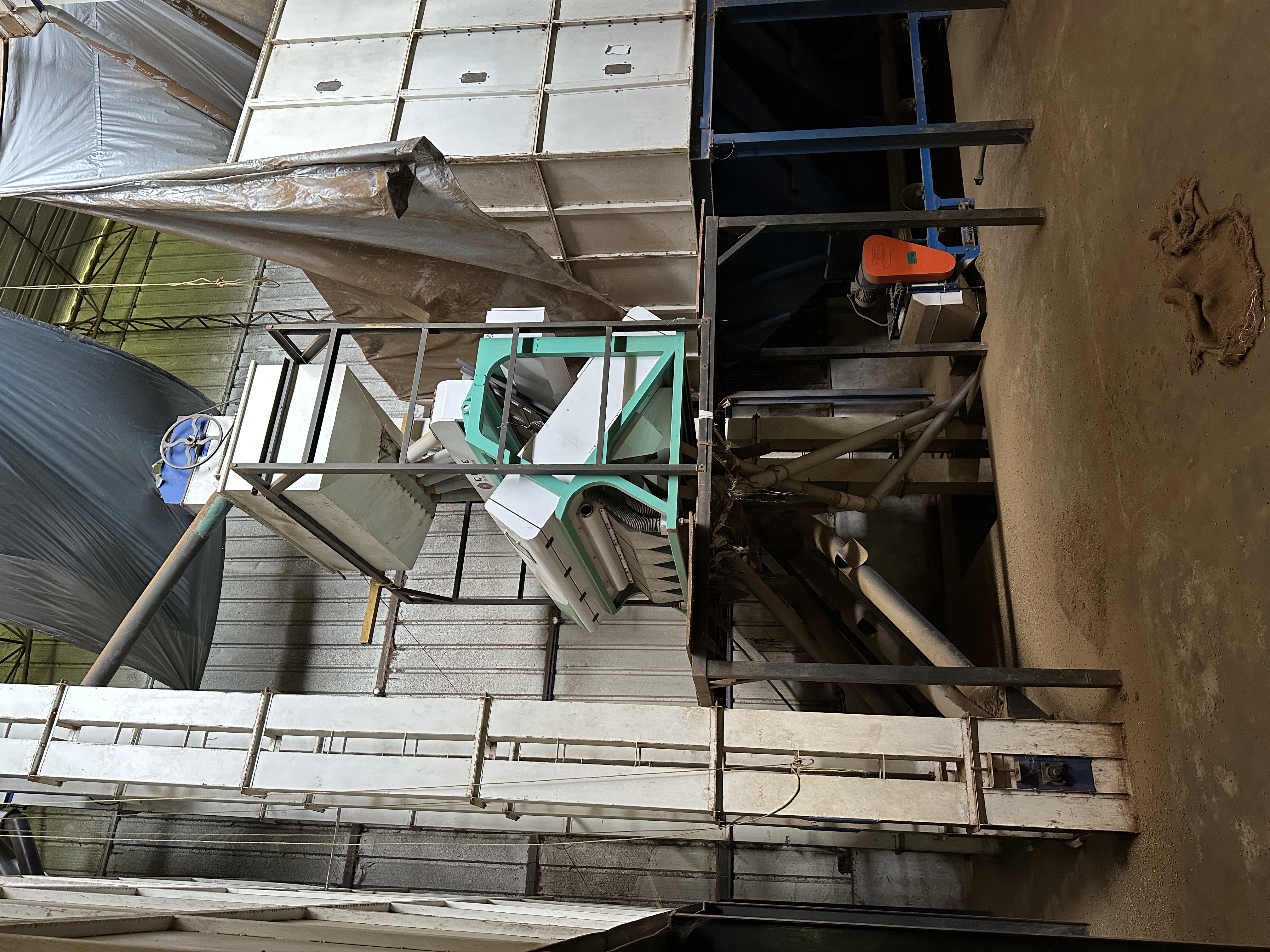Color sorting machine at Neelagiri Coffee Curing Works