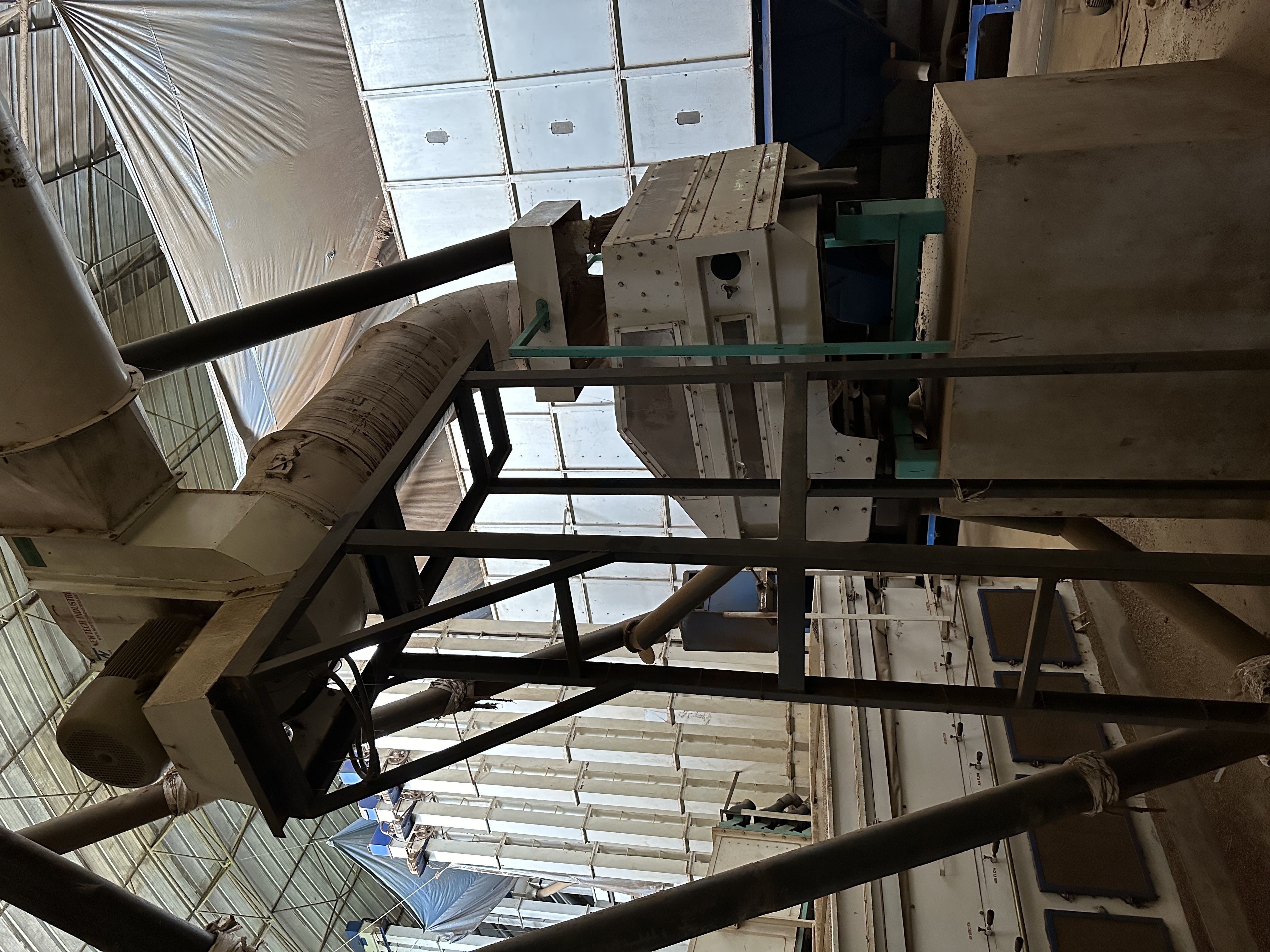 Close-up of processing machinery and conveyor system